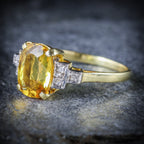 YELLOW BERYL AND DIAMOND TRILOGY RING 18CT GOLD ENGAGEMENT SIDE